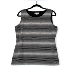 2/$30 Calvin Klein sleeveless blouse top in graphic black/ white stripe.  SZ L